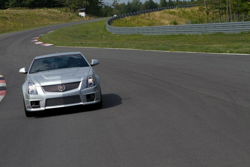 2011_CTS-V-Coupe_06649.jpg - [de]Ein CTS-V Coupe dreht eine Runde beim Monticello Motor Club, am 10. August 2010 in Monticello, New York[en]A Cadillac CTSv Coupe takes a turn at the Monticello Motor Club in Monticello, New York, Tuesday, August 10, 2010. (Photo by Emile Wamsteker for Cadillac)